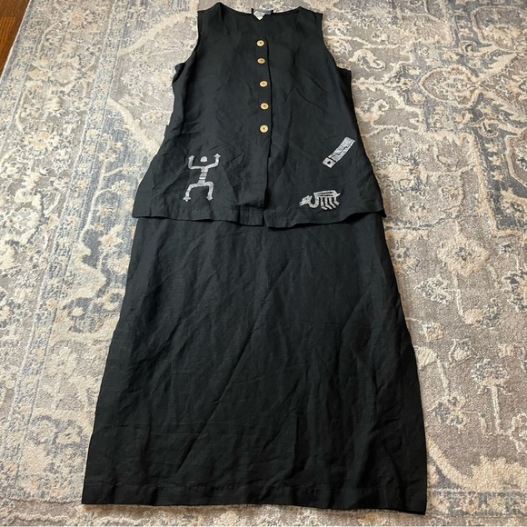 Dresses & Skirts - Black Sleeveless Maxi Dress with Unique Print